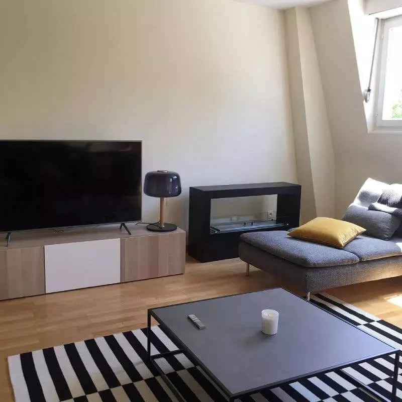 Freistehender Bioethanol Standkamin ANDRO Bio Ethanol Raumteiler Tunnelkamin Stehend Schwarz Wohnzimmer neben TV